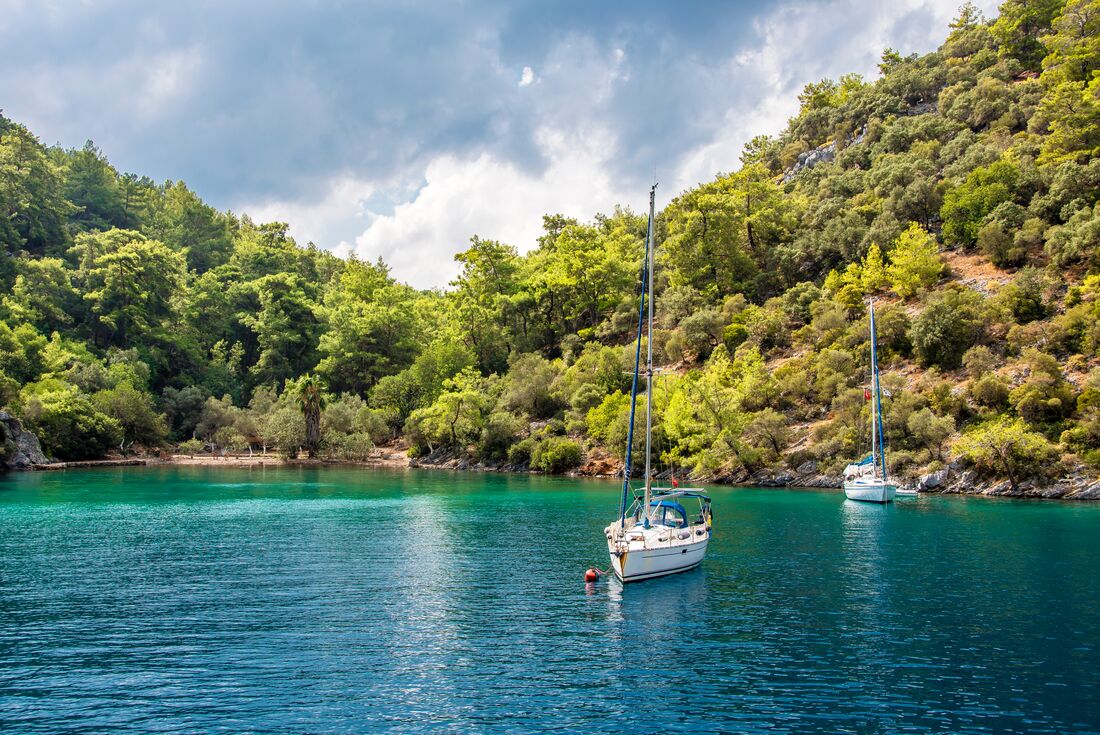 Sailing boat anchored in a bay in Gocek municipality islands in Turkish Riviera