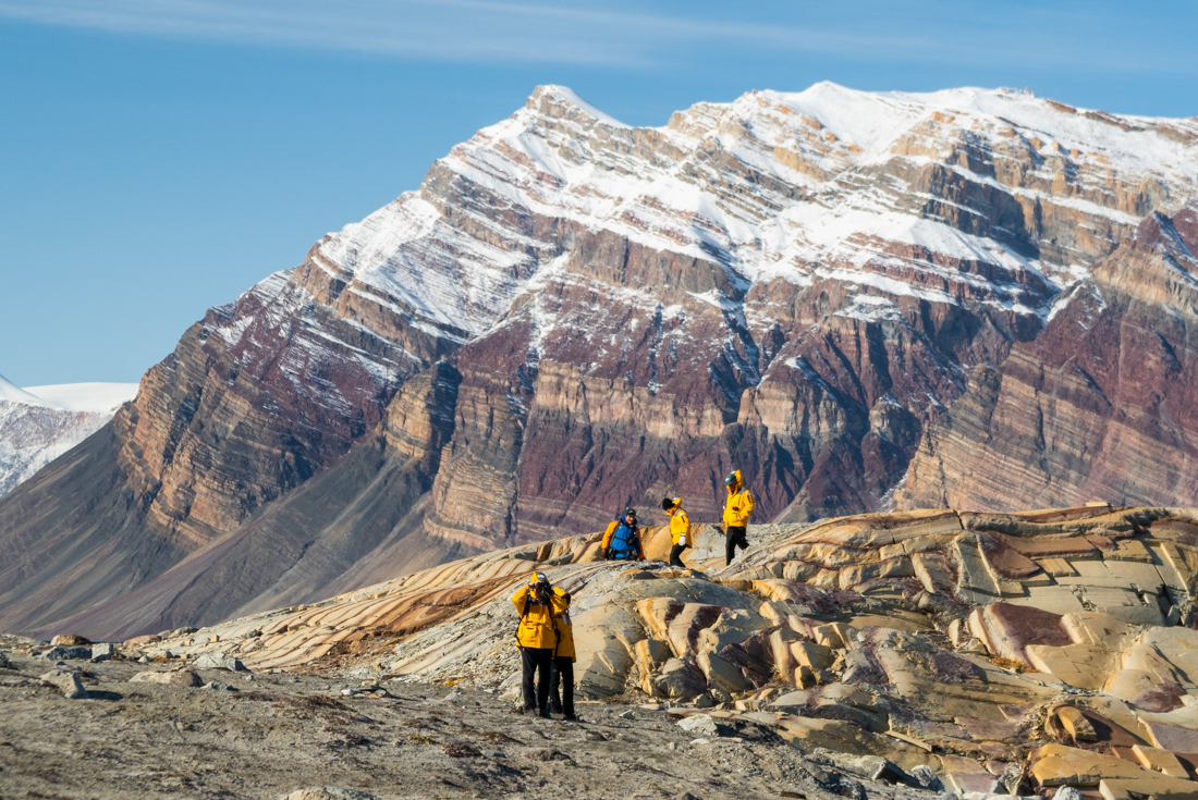 Travellers hiking in Hiking in Skipperdal Valley northeast Greenland
