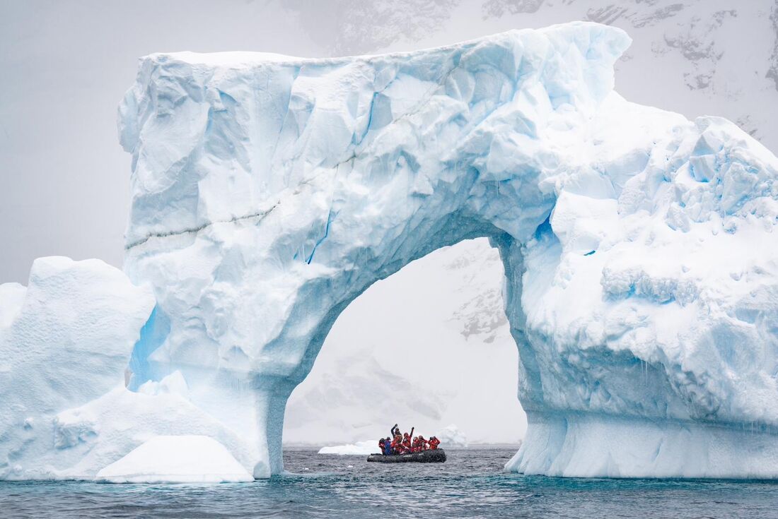 Take in the signifcant scale of Antarctica's ice on a zodiac cruise