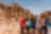Group and tour leader in front of Petra ruins