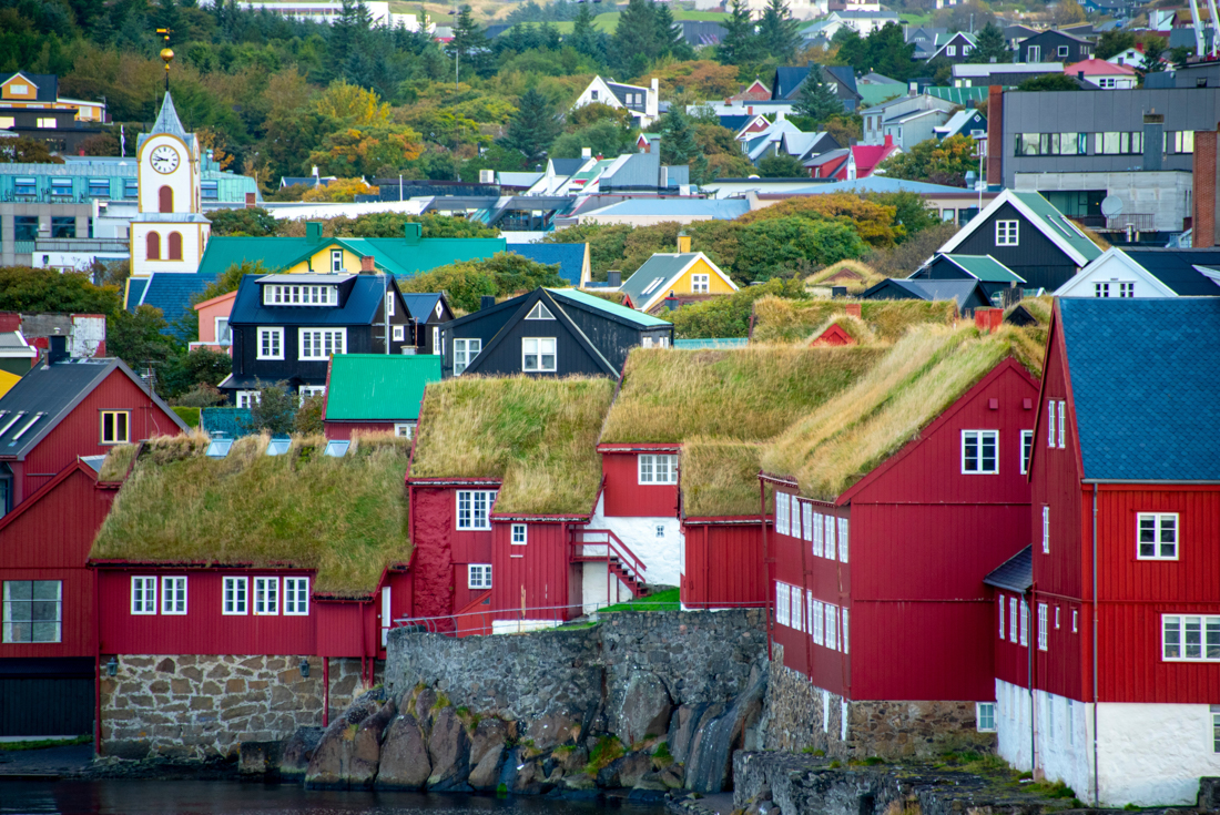 Tingane, grass roofed buildings, on the coast of Torshavn city in the Faroe Islands in Denmark
