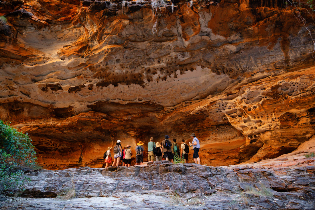 Travellers marvel at the rock texture of Cathedral Gorge in the Bungle Bungles Western Australia