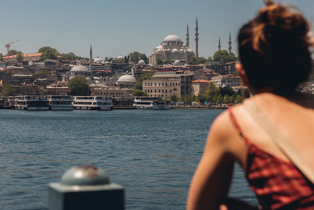 Traveller enjoying the view of the river and the city in Istanbul, Turkey