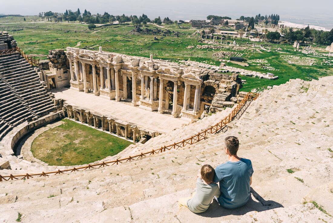 Father and son in the Pamukkale ampitheater in Turkey