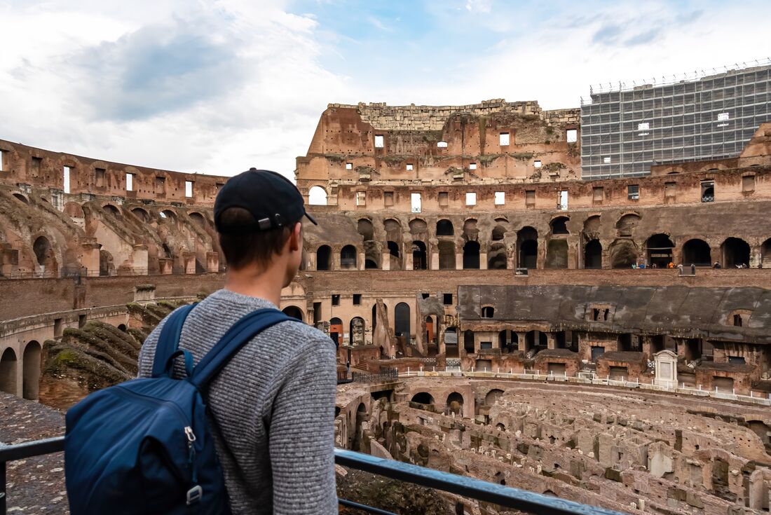 Traveller's point of view of the interior of the Colosseum in Rome, Italy