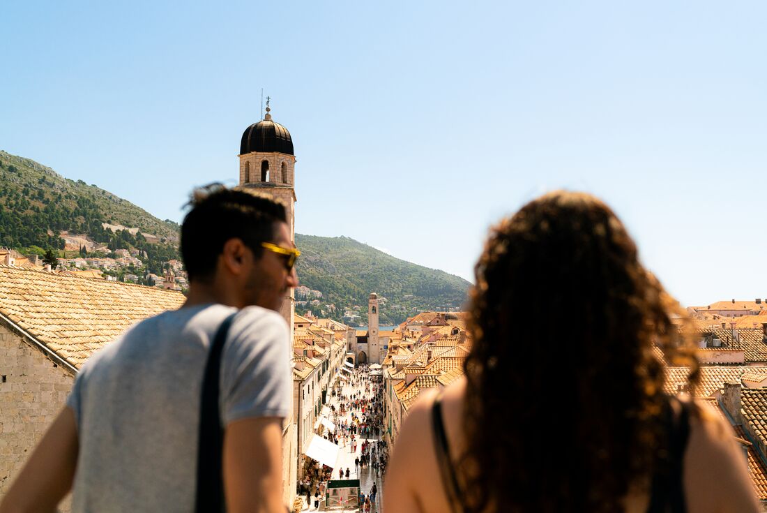 Intrepid travellers looking out over the main street of Dubrovnik, Croatia