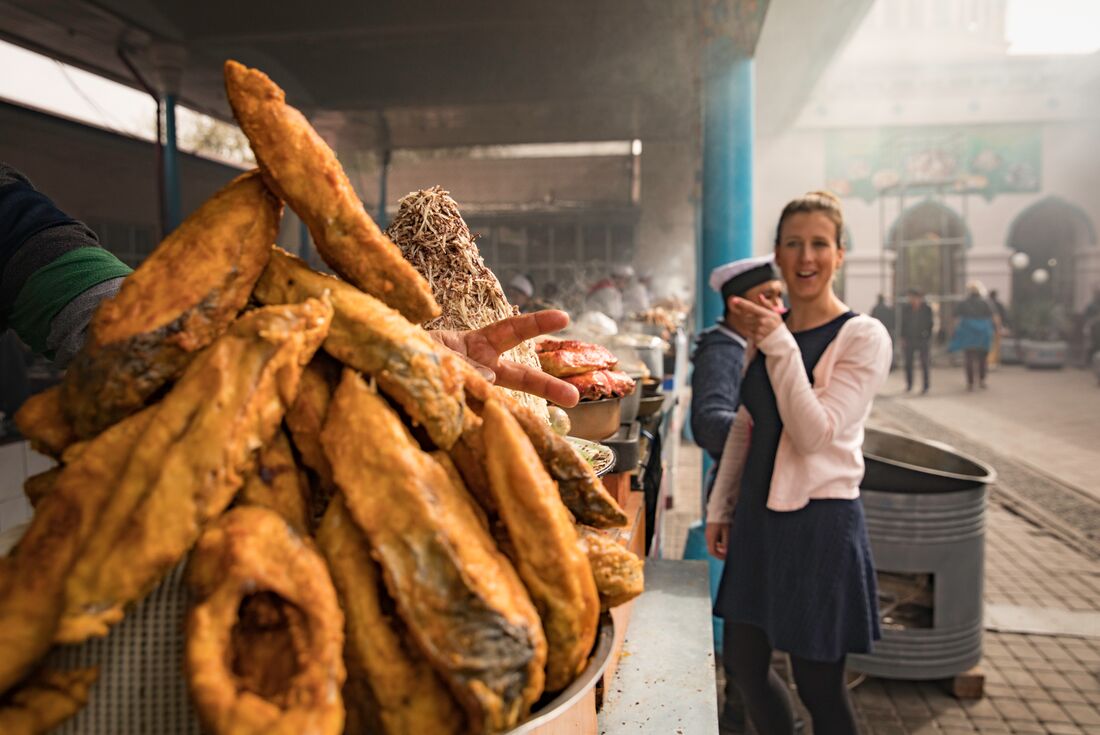 Intrepid traveller finding delectible treats at Chorsu Bazaar