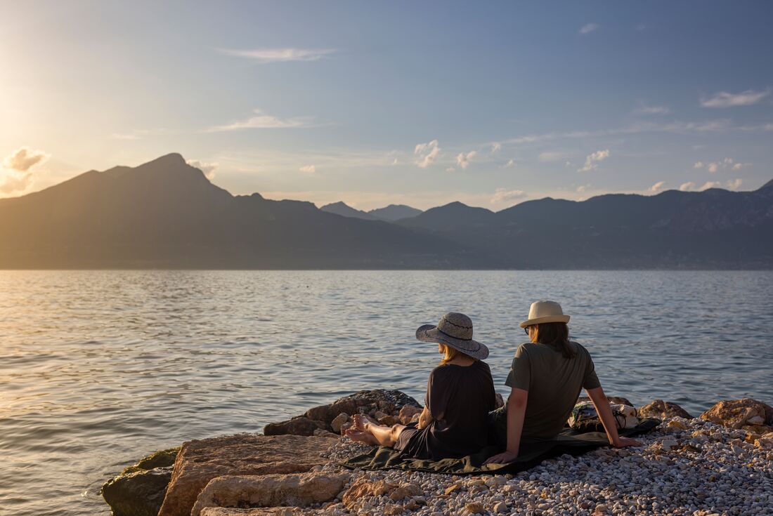 Relaxing in the sunset on the shores of Lake Garda