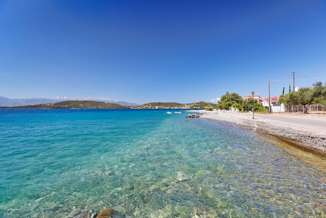 Clear waters of Trizonia Island coast in Greece